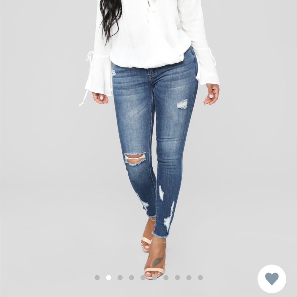 High waisted distressed jeans